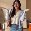 1181-2.png Effortless Campus Chic – Light Cardigan, Floral Top & Classic Blue Jeans Look