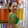vlcsnap-2025-02-05-14h44m41s256.png Kerala Kasavu Pure Cotton White Cream Saree with Multicolor Blouse – A Traditional Masterpiece with a Modern Twist